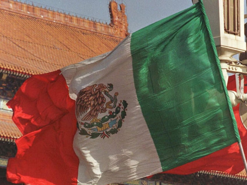 Mexican Flag in China (AP Photo/Mike Fiala)