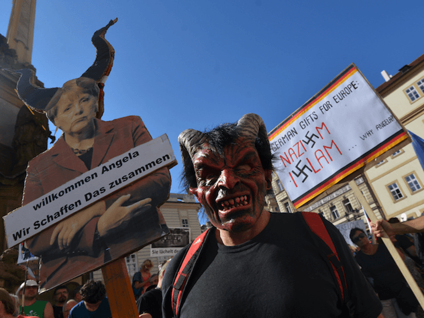 video merkel assassination attempt after protests during czech visit