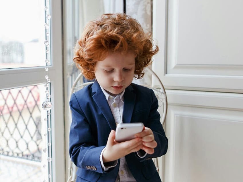 Little boy with cell phone