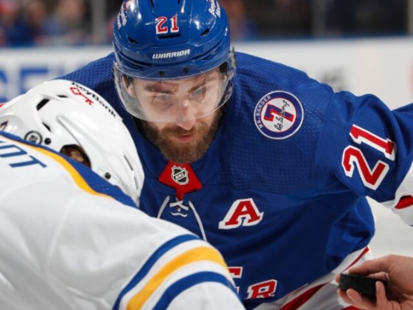 video rangers barclay goodrow forced to exit game after taking puck straight to the face