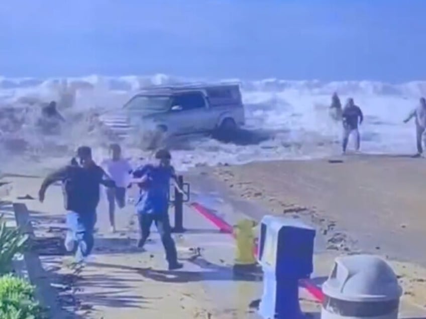 Numerous California coastal towns were hit by massive waves Thursday, leaving people hurt and buildings damaged as a Pacific storm leaned into the area.