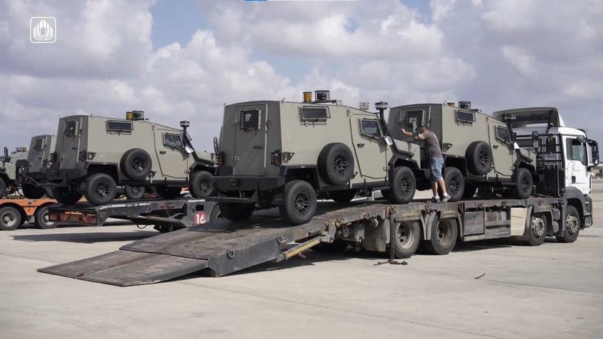 video shows cargo planes delivering armored vehicles to israeli defense forces