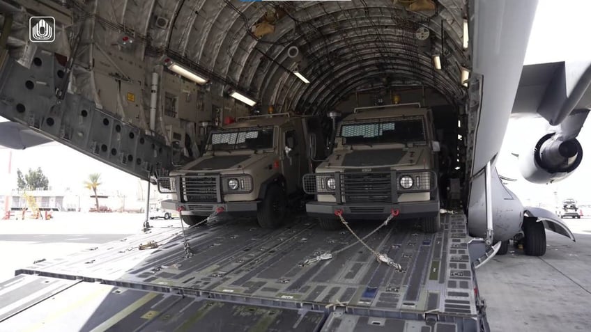 video shows cargo planes delivering armored vehicles to israeli defense forces