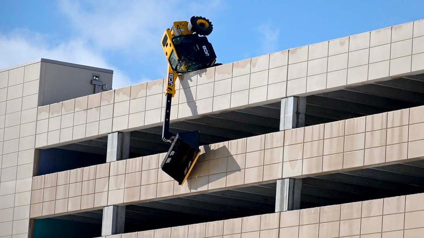 Madison parking garage mishap, equipment tips while clearing snow