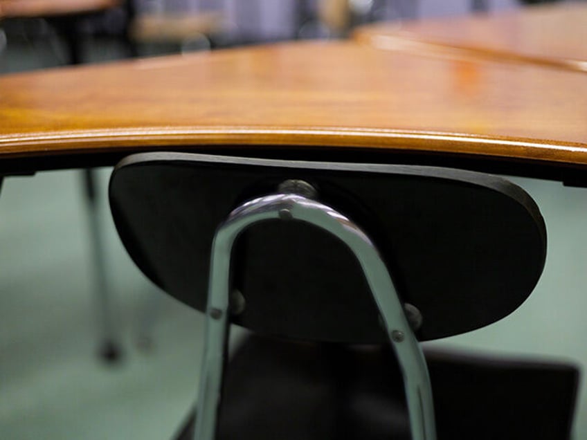 video shows michigan high school student allegedly hitting teacher in head with metal chair