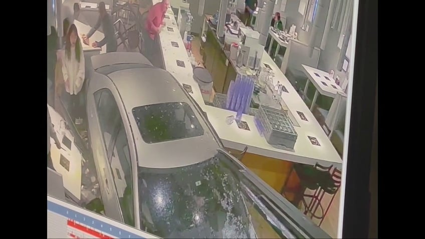 video shows moment car slams through washington state restaurant narrowly missing customers eating dinner