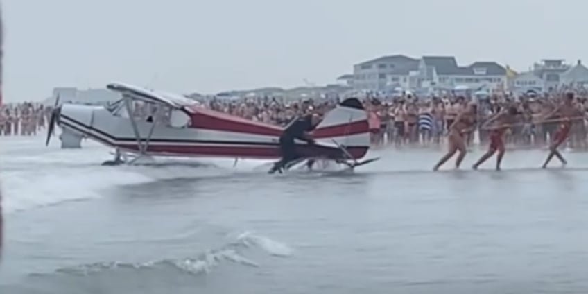 video shows plane that crashed at new hampshire beach being pulled out of waves