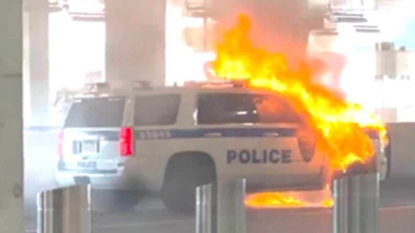 video shows police vehicle in flames at laguardia airport in new york city