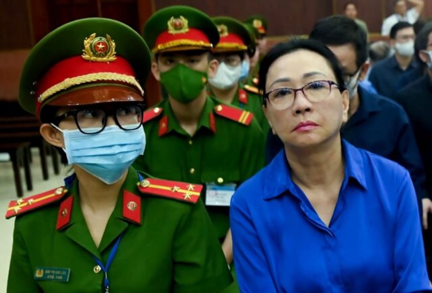 Vietnamese property developer Truong My Lan (R) was found guilty of swindling money from S