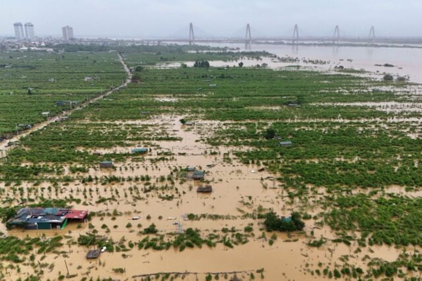 Floodwaters caused by Typhoon Yagi have destroyed crops across north Vietnam