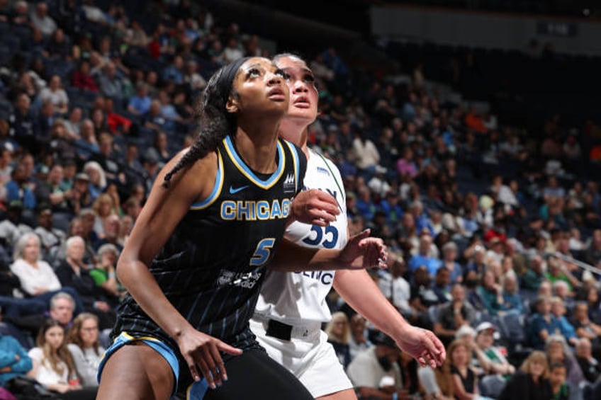 Angel Reese of the Chicago Sky boxes out during the game against the Minnesota Lynx during a WNBA preseason game on May 3, 2024 at Target Center in...