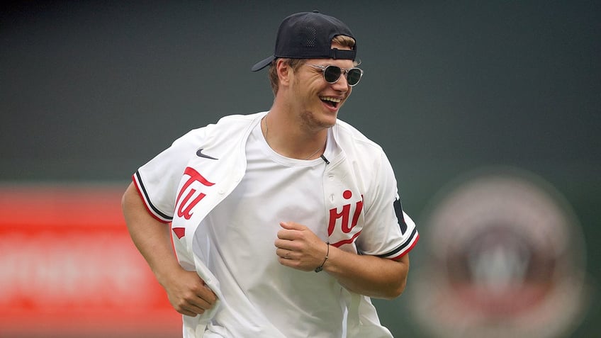 J.J. McCarthy throws out first pitch