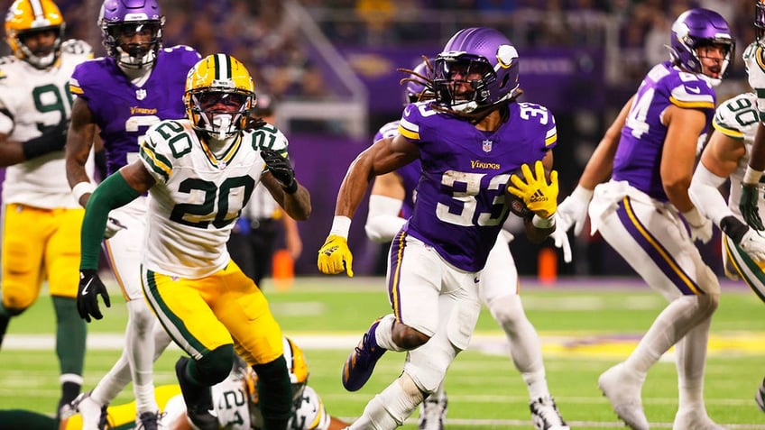 Aaron Jones runs