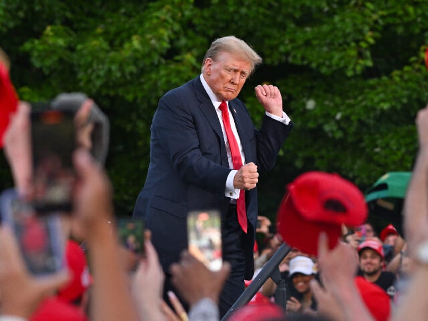 NEW YORK, NEW YORK - MAY 23: Former U.S. President Donald Trump dances at his campaign ral