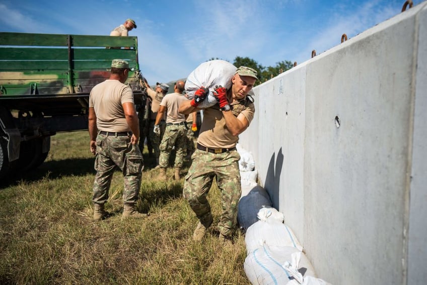 villagers in nato territory get bomb shelters to protect from russian drone attack debris