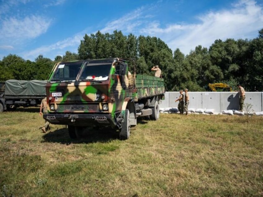 villagers in nato territory get bomb shelters to protect from russian drone attack debris