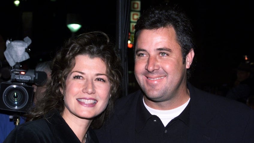 vince gill and amy grant smile in photo from 2000