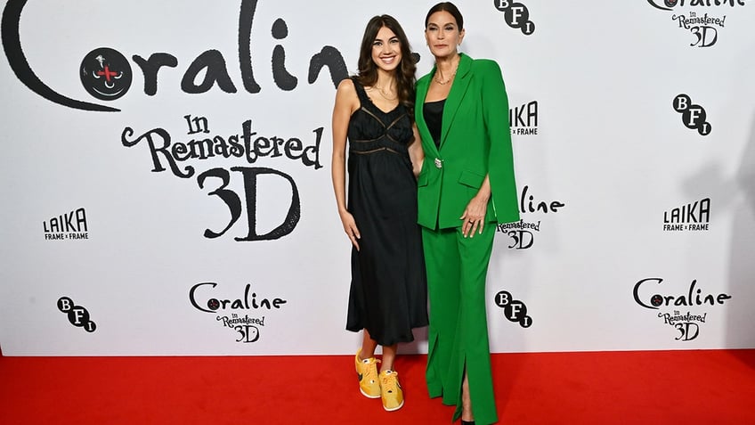 Teri Hatcher in a green suit alongside her daughter Emerson Tenney.