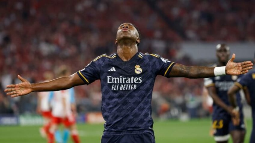 Real Madrid's Brazilian forward Vinicius Junior celebrates scoring against Bayern Munich i