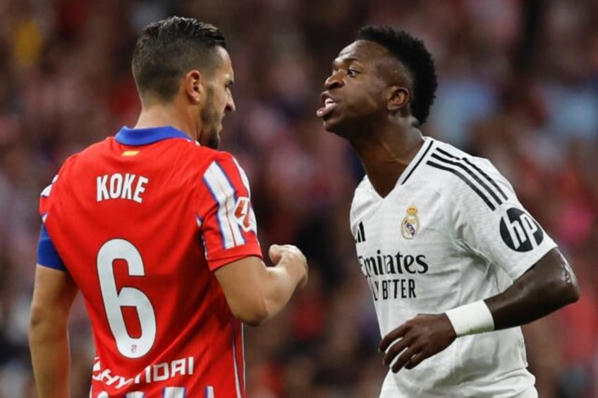 Real Madrid forward Vinicius Junior (R) is hoping to win the Ballon d'Or at the end of Oct