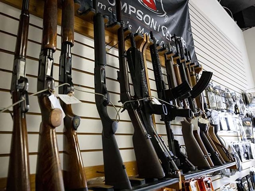 Rifles for sale at a store in Miami Beach, Florida, US, on Monday, Oct. 23, 2023. Anxiety about antisemitism is causing some people to rethink their reluctance to own a firearm and the Sunshine State's laws make it easier to obtain one. Photographer: Eva Marie Uzcategui/Bloomberg via Getty Images