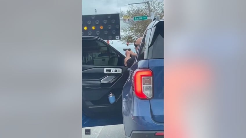 virginia driver filmed pulling gun on motorcyclist during apparent road rage