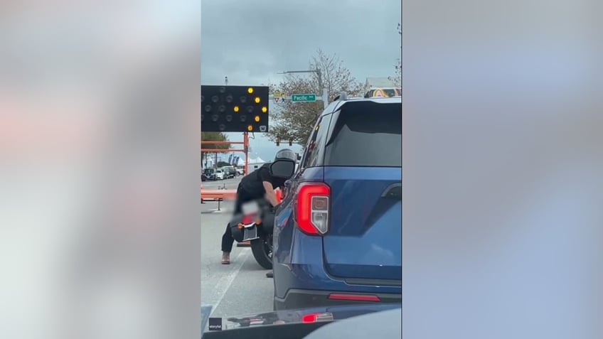 virginia driver filmed pulling gun on motorcyclist during apparent road rage