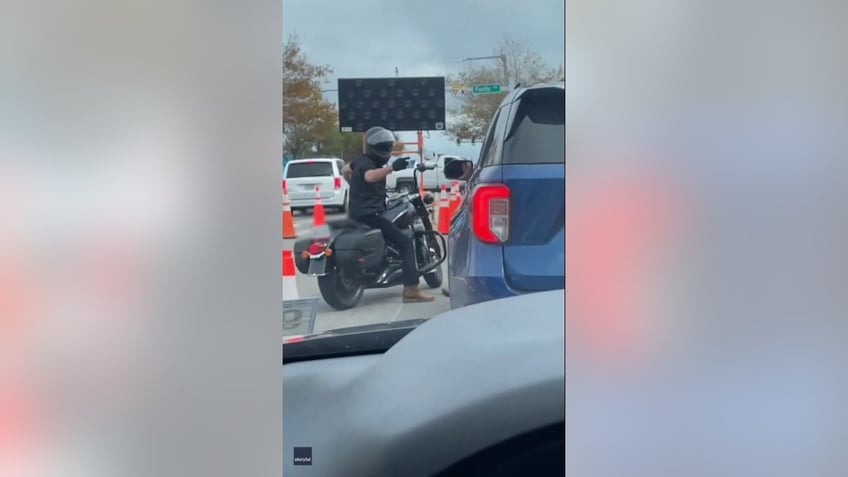 virginia driver filmed pulling gun on motorcyclist during apparent road rage