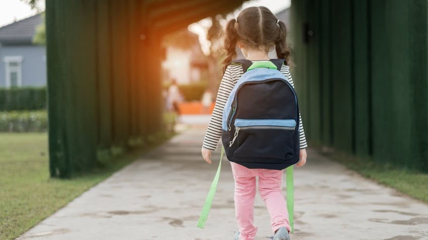 girl with backpack