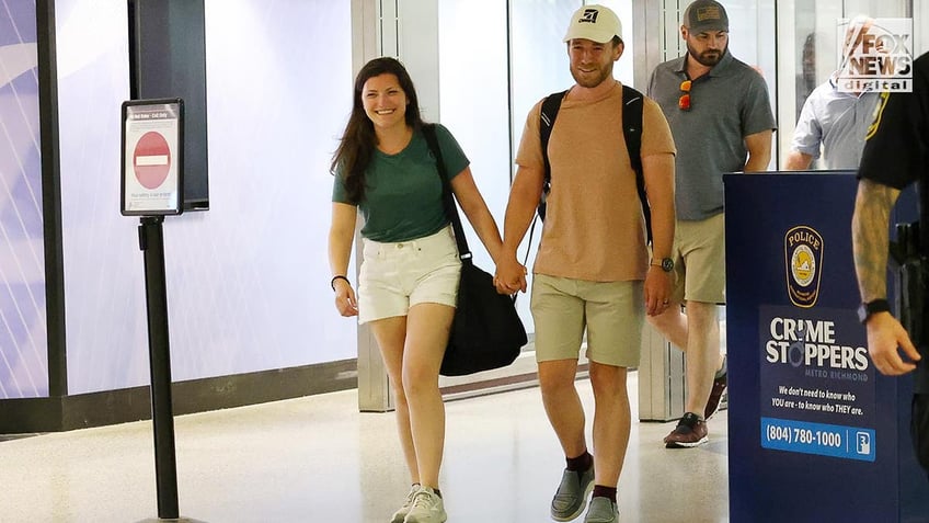 Tyler Wenrich arrives at the airport after being released from Turks and Caicos