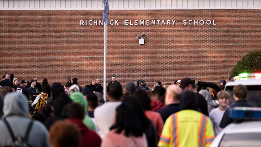 Students gather outside Richneck Elementary after teacher was shot