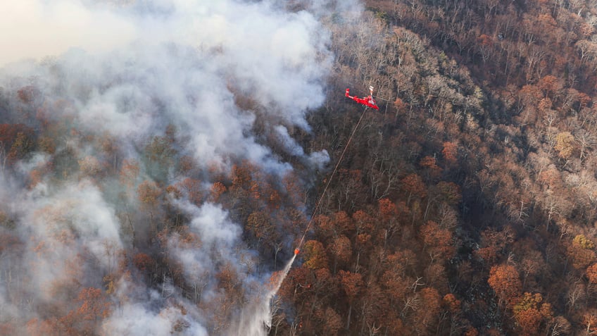 virginias governor declares a state of emergency as firefighters battle wildfires