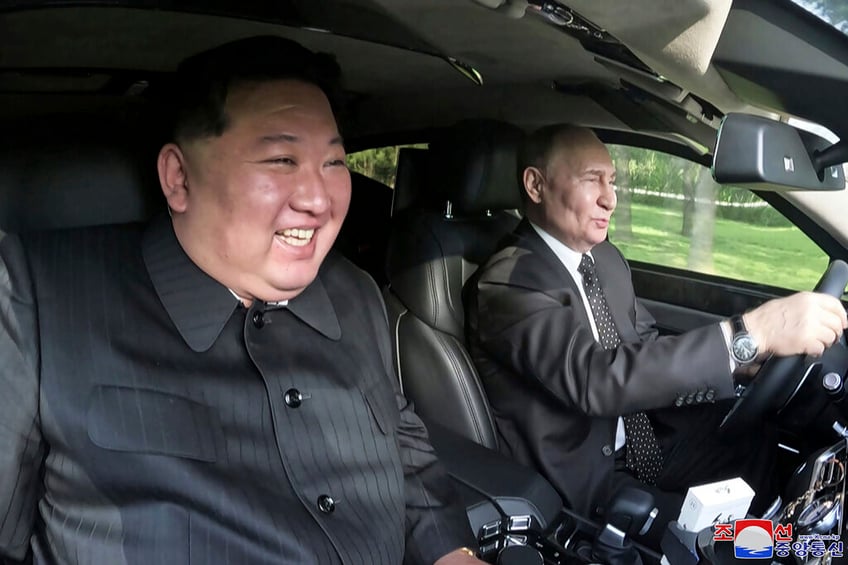 vladimir putin and kim jong un trade dogs limousine and more as gifts