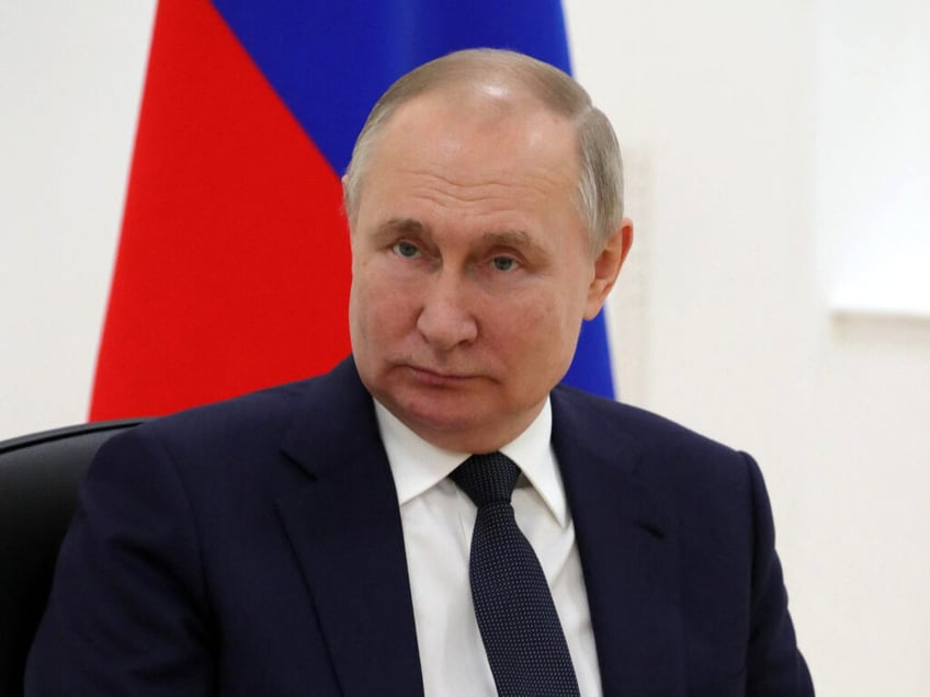 Russia's President Vladimir Putin looks on during talks with Belarus President Alexander Lukashenko at the engineering building of the technical complex of the Soyuz-2 space rocket complex at the Vostochny Cosmodrome, some 180 km north of Blagoveschensk, Amur region, on April 12, 2022. (Photo by Mikhail KLIMENTYEV / Sputnik / AFP) (Photo by MIKHAIL KLIMENTYEV/Sputnik/AFP via Getty Images)