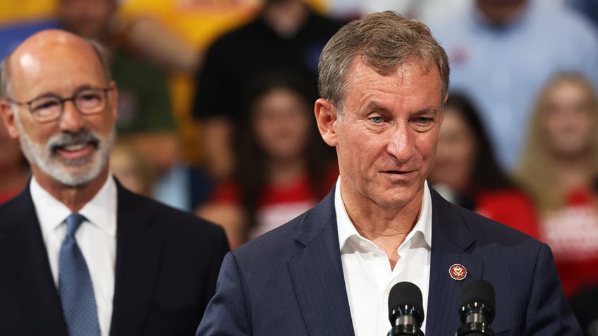 Matt Cartwright, right, speaking at an Aug. 2022 campaign event.