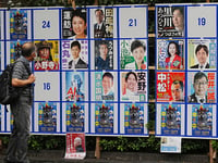 Wacky antics in Tokyo's governor race, from raunchy photos to dog posters, take over the city