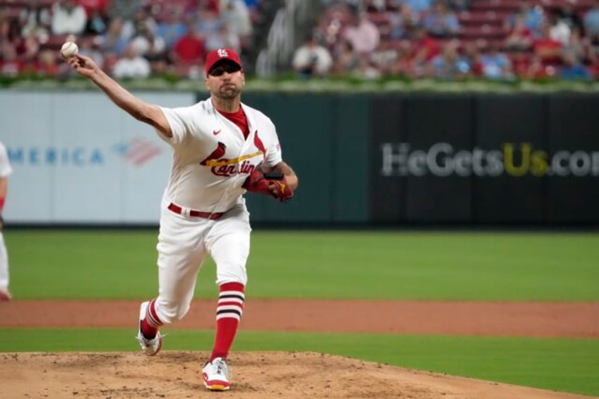 wainwright gets 200th win as the cardinals blank the brewers 1 0