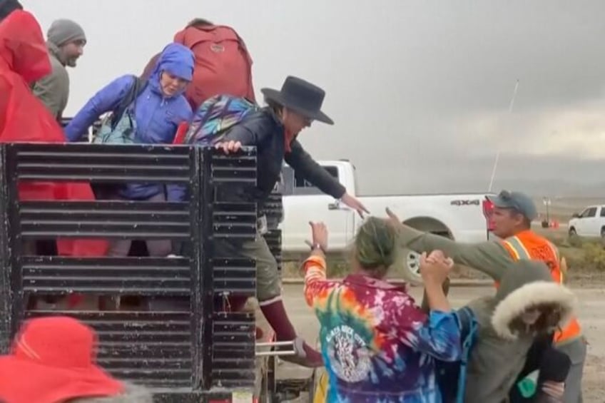 wait times to exit burning man drop after flooding left tens of thousands stranded in nevada desert