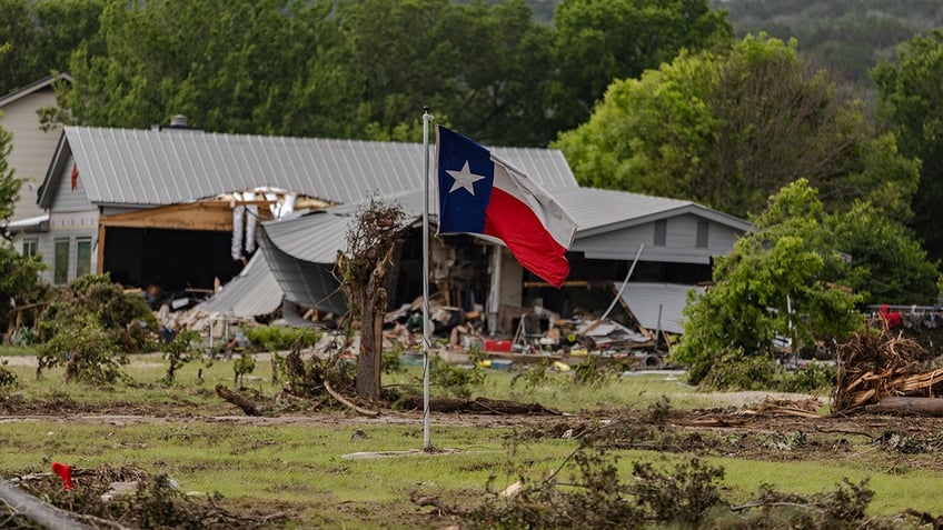 Texas flag among flood damage debris