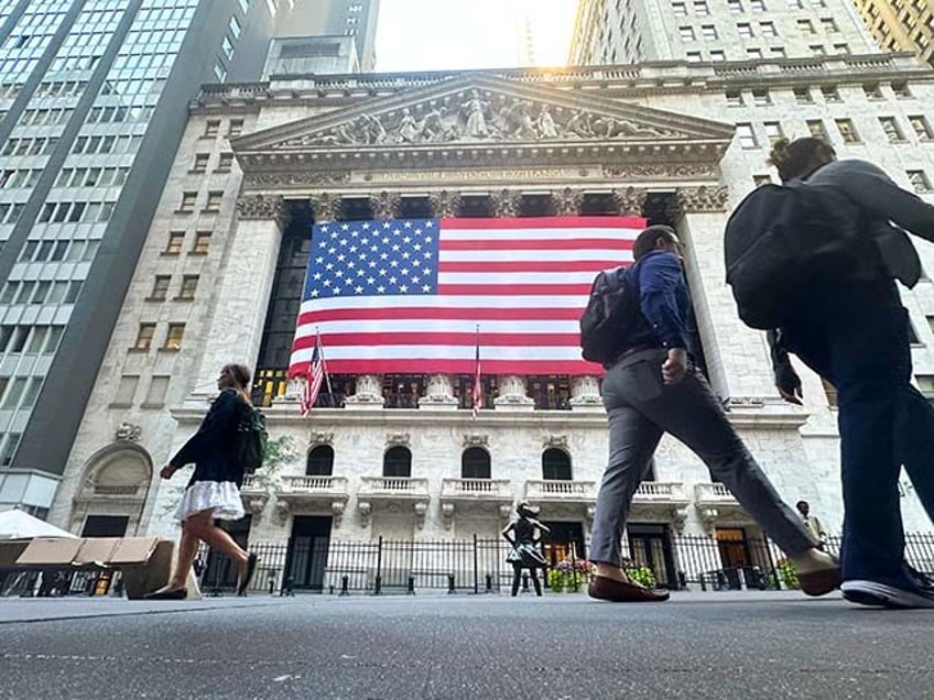 The American flag hangs from the front of the New York Stock Exchange on Sept. 10, 2024, i