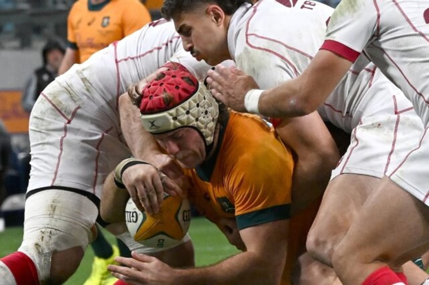 Australia's Fraser McReight scoring under pressure from Georgia at Allianz Stadium in Sydn