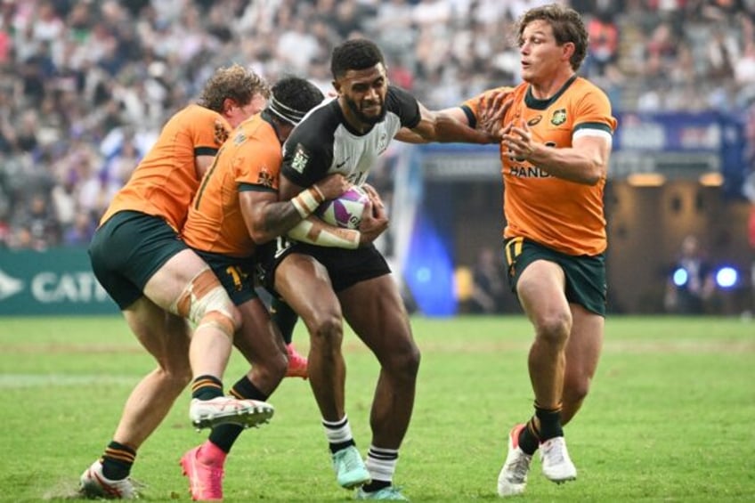 Michael Hooper (R) in action for Australia in Hong Kong