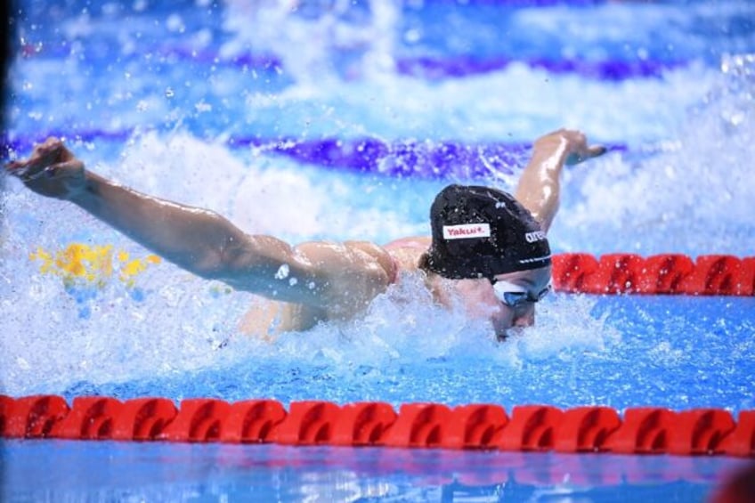 Gretchen Walsh butterflying to another short course world record