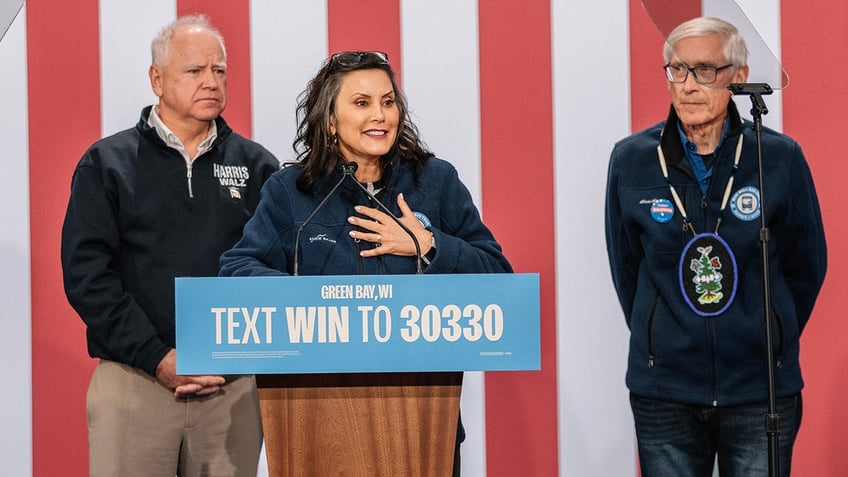 Walz, Whitmer, and Evers onstage