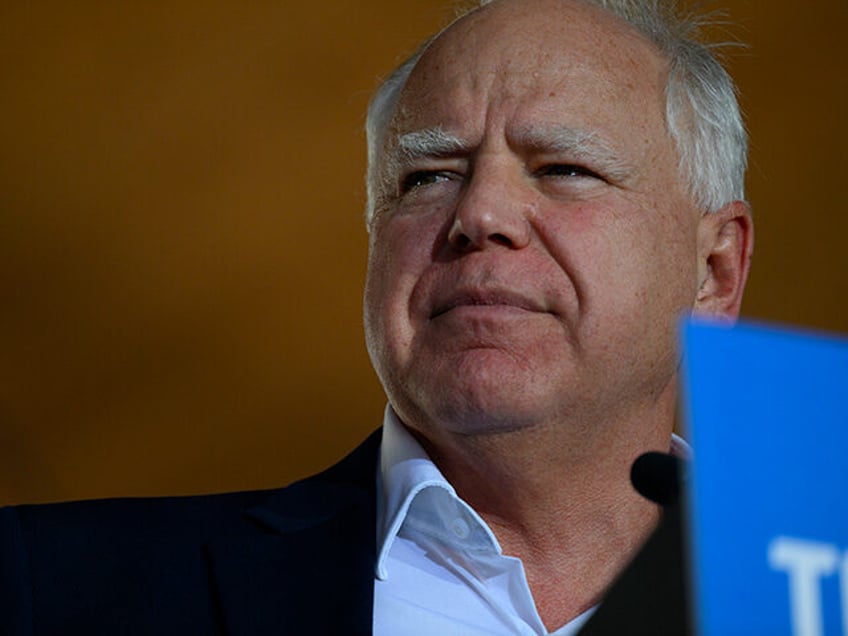 Democratic vice presidential nominee Minnesota Governor Tim Walz speaks to a gathered crow