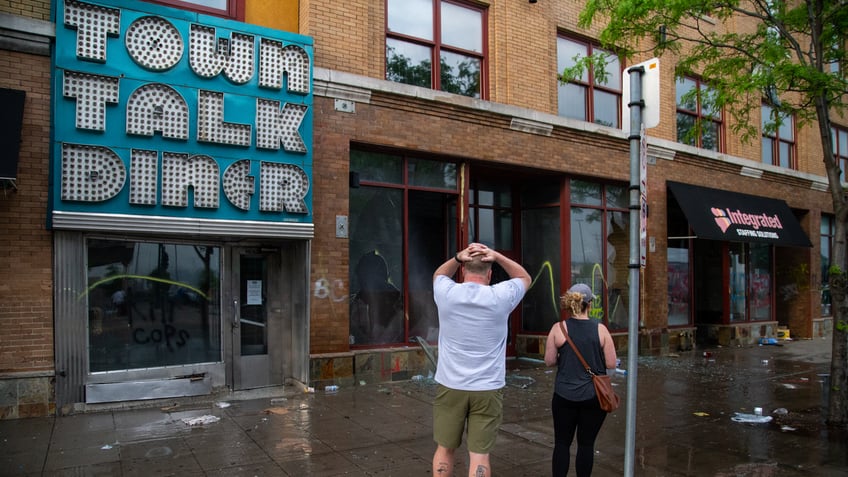 diner owneres survey damage to their eatery from Minneapolis riots