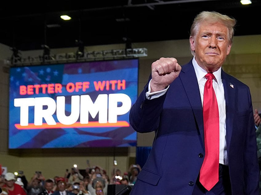 Republican presidential nominee former President Donald Trump arrives for a town hall at L