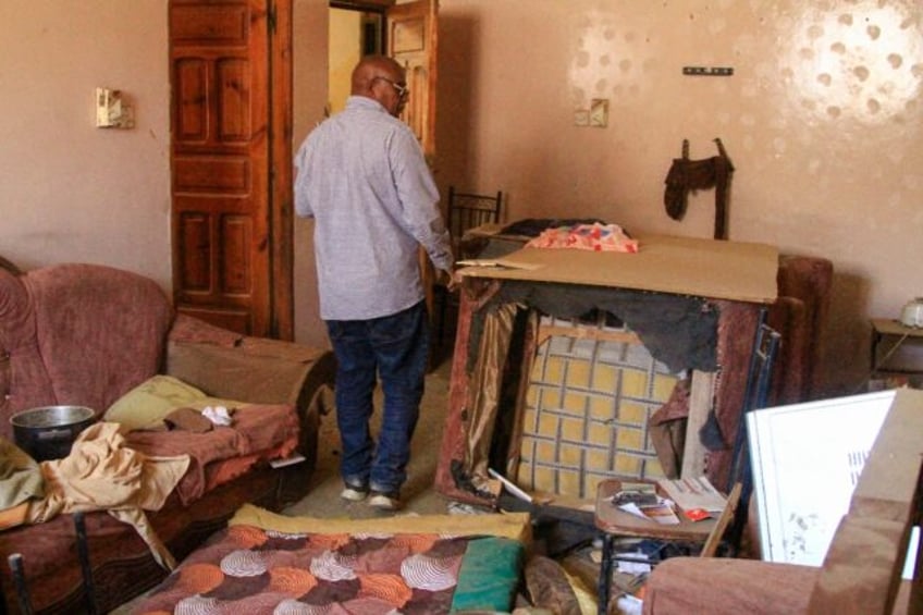 AFP journalist Abdelmoneim Abu Idris Ali in his ransacked home in Khartoum