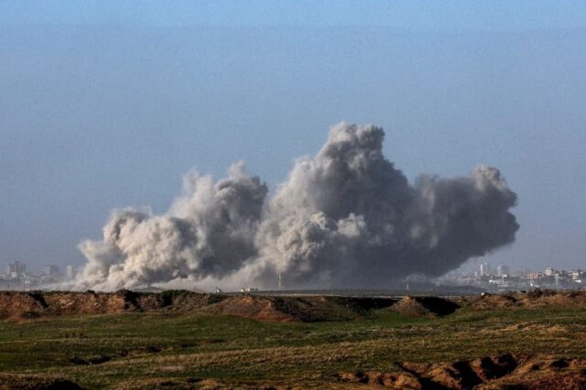 Seen from southern Israel, smoke billows after Israeli bombardment in the Gaza Strip