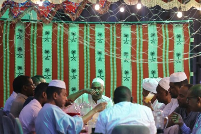 Saudi Arabia's Sudanese community gather in Riyadh to eat, pray and console each other abo